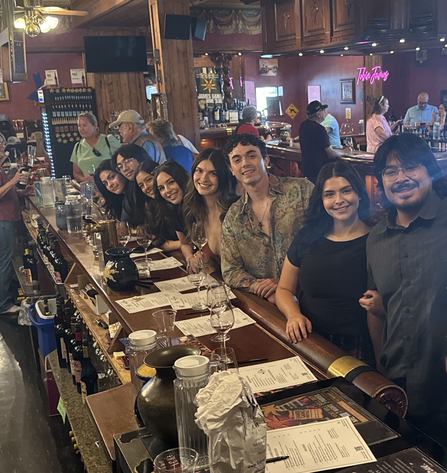Friends enjoying a wine tasting together at a Paso Robles winery
